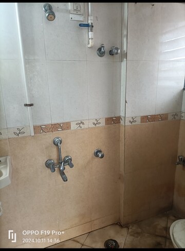 Bathroom in 2 BHK Apartment at Yashraj Park CHS, Kasarvadavali – for Sale