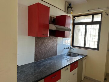 Kitchen in 2 BHK Apartment at Puranik Hometown, Ghodbunder Road – for Sale