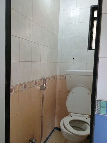 Bathroom in 1 BHK Apartment at Mudit Garden, Kopar Khairane – for Sale