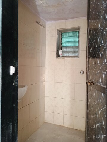Bathroom in 1 BHK Apartment at Kopar Khairane Sector 19 – for Sale