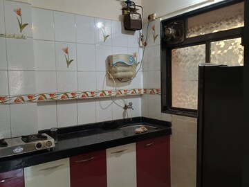 Kitchen in 1 BHK Apartment at Shakuntal CHS, Kopar Khairane – for Sale