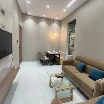 Living Room in 1 BHK Apartment at Sunteck West World, Tivri – for Sale