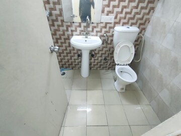 Bathroom in 2 BHK Apartment at Shri Radha Aqua Garden, Sector 16b Greater Noida – for Sale