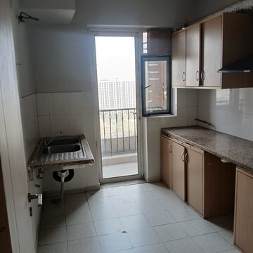 Kitchen in 4 BHK Apartment at DLF New Town Heights I, Sector 90 – for Sale