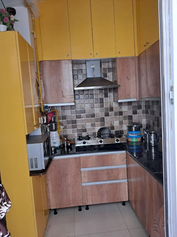 Kitchen, prateek-grand-city 3 Bedroom 1585 Sq.Ft. Apartment In Siddharth Vihar Ghaziabad 7808867