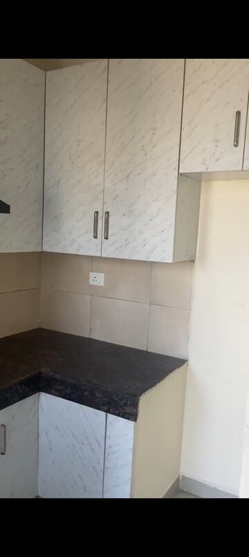 Kitchen in 2 BHK Apartment at JKG Palm Resort, Raj Nagar Extension – for Sale