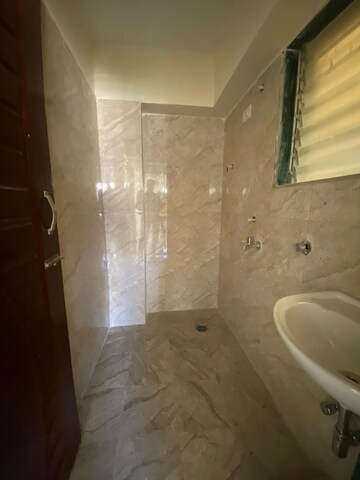 Bathroom in 1 BHK Apartment at Lodha Palava Crown, Dombivli East – for Rent