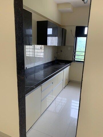 Kitchen in 2 BHK Apartment at Satguru Solitaire, Kasarvadavali – for Sale
