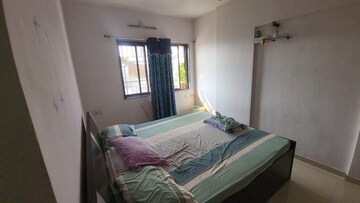 Bedroom in 2 BHK Apartment at Puraniks Kavya Dhara CHS, Dhokali – for Sale