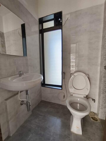 Bathroom in 2 BHK Apartment at Acme Ozone, Manpada – for Sale