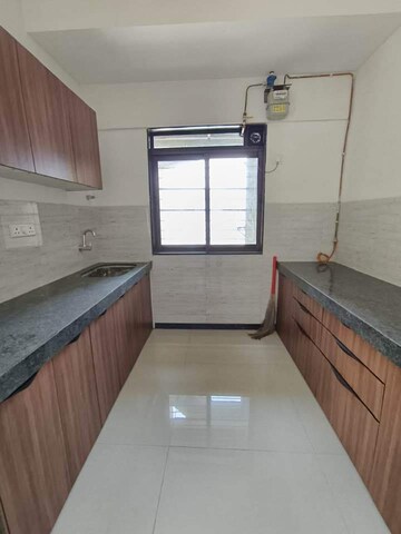 Kitchen in 2 BHK Apartment at Acme Ozone, Manpada – for Sale