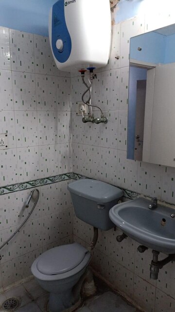 Bathroom in 4 BHK Apartment at Ambience Island, Sector 24 – for Sale