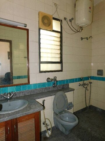 Bathroom in 4 BHK Penthouse at RMZ Woodsvale, Benson Town – for Sale