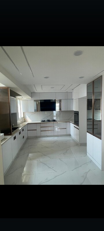 Kitchen in 2 BHK Apartment at Jaypee Greens Aman, Sector 151 – for Sale