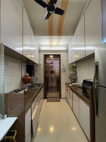 Kitchen in 1 BHK Apartment at Amrapali CHS Kamothe, Kamothe Sector 21 – for Sale