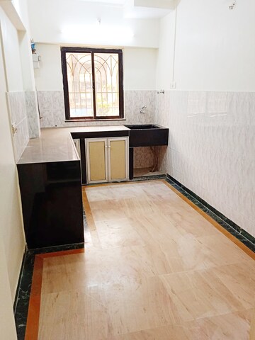 Kitchen in 2 BHK Apartment at Vashveen Apartments, Andheri West – for Rent