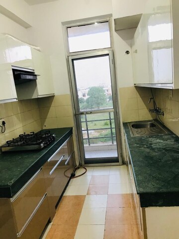 Kitchen in 3 BHK Apartment at Omaxe R2, Gomti Nagar – for Sale