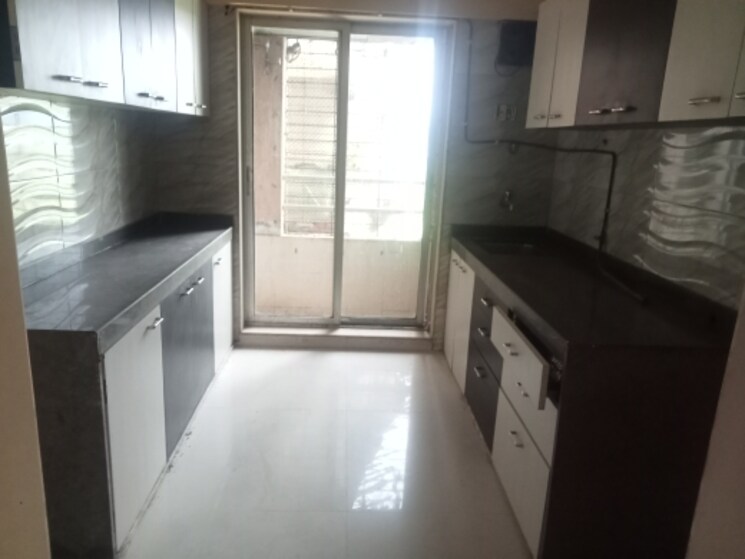 Kitchen, unique-shanti-poonam-estate-cluster-2 2 Bedroom 674 Sq.Ft. Apartment In Mira Road Thane 7812739