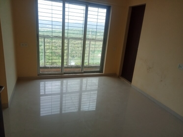 Room, unique-shanti-poonam-estate-cluster-2 2 Bedroom 674 Sq.Ft. Apartment In Mira Road Thane 7812739