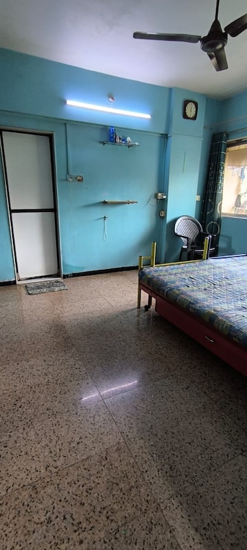 Bedroom in 2 BHK Apartment at Dheeraj Garden, Jogeshwari East – for Sale