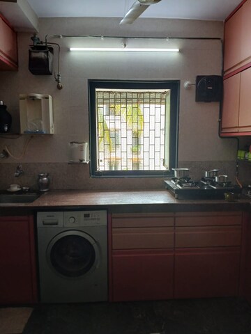 Kitchen in 2 BHK Apartment at Satya Pushpa CHS, Panch Pakhadi – for Sale