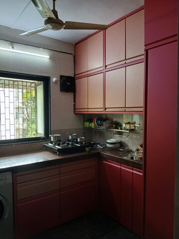 Kitchen in 2 BHK Apartment at Satya Pushpa CHS, Panch Pakhadi – for Sale