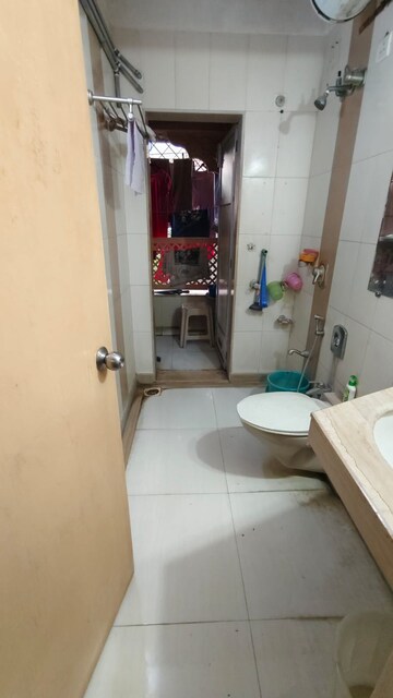 Bathroom in 1 BHK Apartment at Navyug CHS, Naupada – for Sale