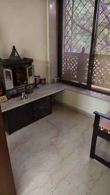 Kitchen in 1 BHK Apartment at Navyug CHS, Naupada – for Sale