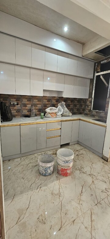 Kitchen in 3 BHK Apartment at Nilgiri Apartments, Sector 34 – for Sale