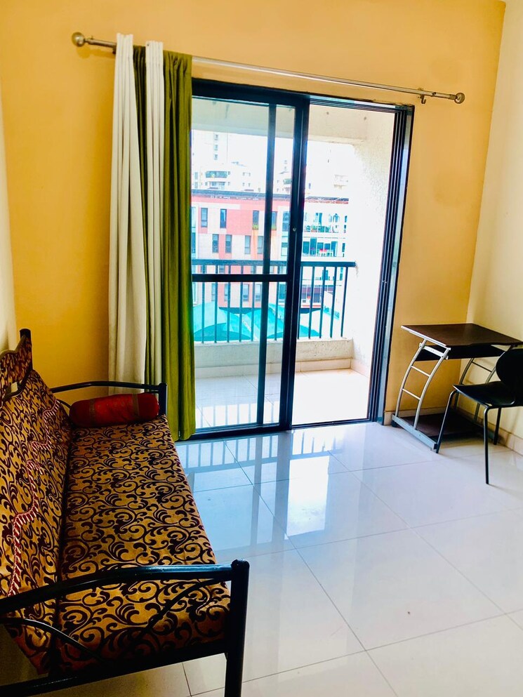 Bedroom, magarpatta-city-zinnia 1 Bedroom 560 Sq.Ft. Apartment In Hadapsar Pune 7813559