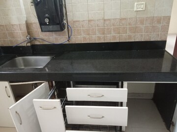 Kitchen in 1 BHK Apartment at Magarpatta City Zinnia, Hadapsar – for Sale