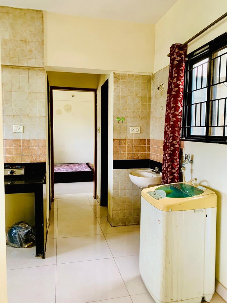 Living Room, magarpatta-city-zinnia 1 Bedroom 650 Sq.Ft. Apartment In Hadapsar Pune 7813591