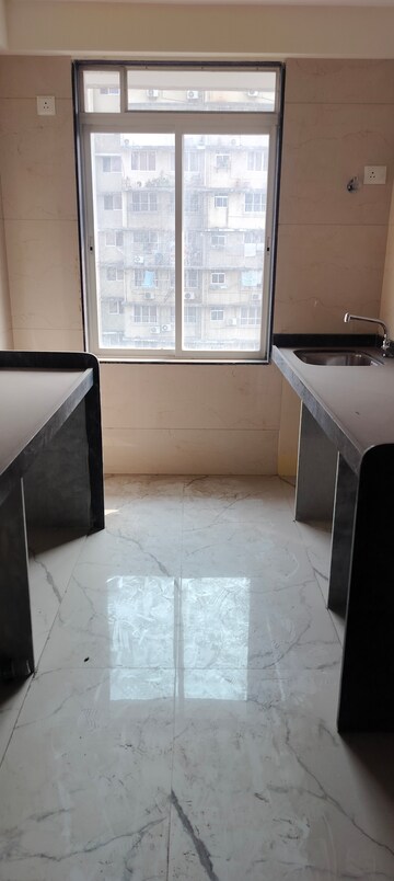 Kitchen in 2 BHK Apartment at Tattva Mittal Cove, Andheri West – for Sale