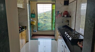 Kitchen in 2 BHK Apartment at Prestige Residency Hill View, Ghodbunder Road – for Sale