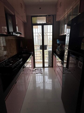Kitchen in 1 BHK Apartment at Vastusankalp Punyodaya Rio, Kalyan West – for Sale