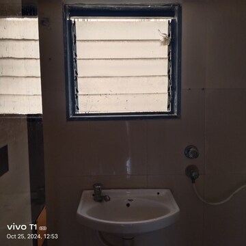 Bathroom in 1 BHK Apartment at RNA NG Shree Ram Van, Vasai East – for Sale