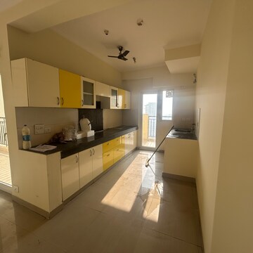 Kitchen in 2 BHK Apartment at Paramount Floraville, Sector 137 – for Sale