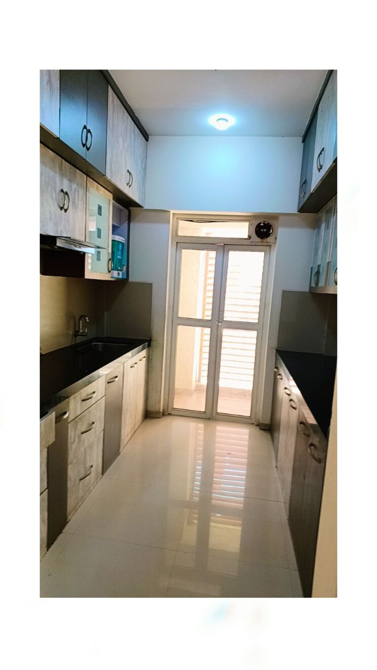 Kitchen, lodha-belmondo 2 Bedroom 900 Sq.Ft. Apartment In Gahunje Pune 7816258