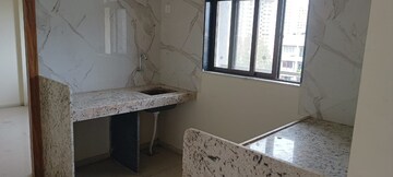 Kitchen in 2 BHK Apartment at K M Horizon Palms III, Owale – for Sale