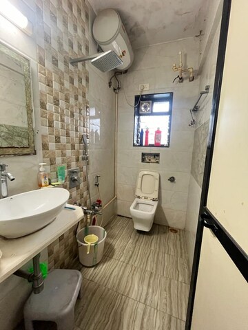 Bathroom in 1.5 BHK Apartment at Cosmos Tower, Majiwada – for Sale