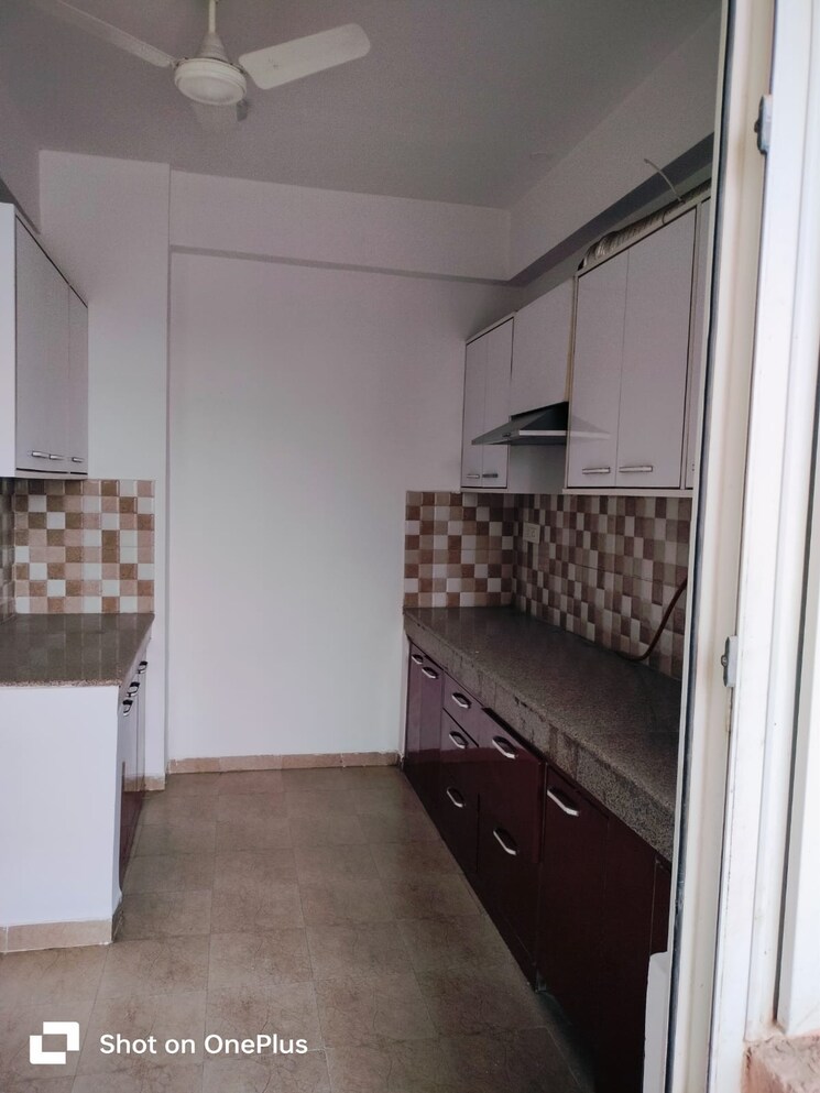 Kitchen, tulip-purple 4 Bedroom 2400 Sq.Ft. Apartment In Sector 69 Gurgaon 7816435