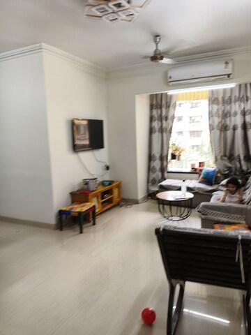 Living Room in 1 BHK Apartment at Aashapura Crown City, Kalyan East – for Sale