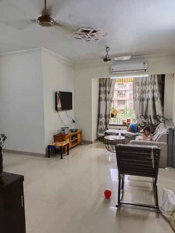Living Room in 1 BHK Apartment at Aashapura Crown City, Kalyan East – for Sale
