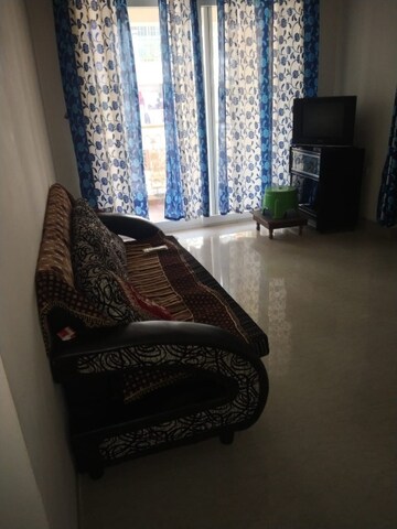 Living Room in 2 BHK Apartment at Tharwani Vedant Nakshatra, Badlapur West – for Sale