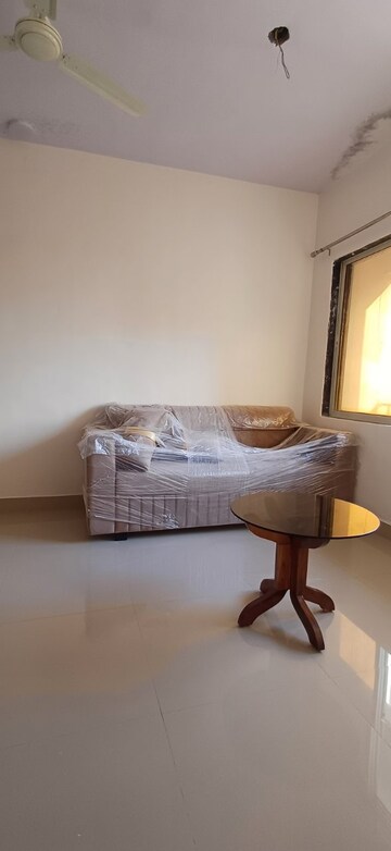 Living Room in 1 BHK Apartment at Umroli – for Sale