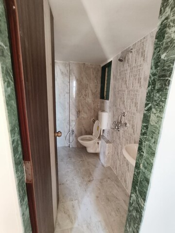 Bathroom in 1 BHK Apartment at Mohan Nano Estates, Ambernath West – for Sale