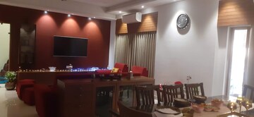 Living Room in 4 BHK Apartment at Adani Shantigram Water Lily, Shantigram – for Sale