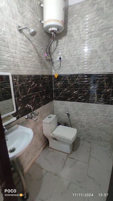 Bathroom in 2 BHK Builder Floor at Mehrauli – for Rent