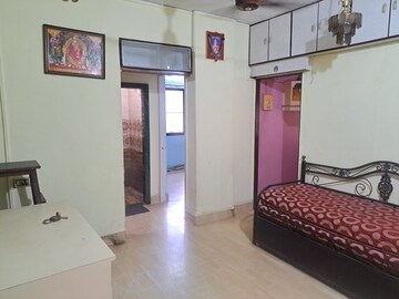 Living Room in 1 RK Apartment at Kavya Hill View CHS, Anand Nagar – for Sale