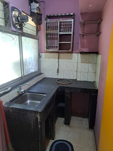 Kitchen in 1 RK Apartment at Kavya Hill View CHS, Anand Nagar – for Sale